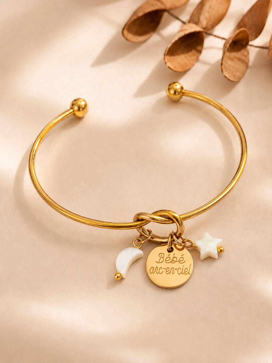 Bracelet jonc nœud avec nacre naturelle.