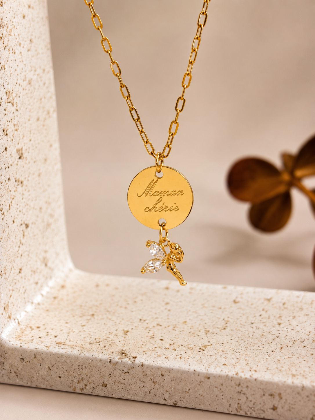 Médaille en acier inoxydable or poli miroir.