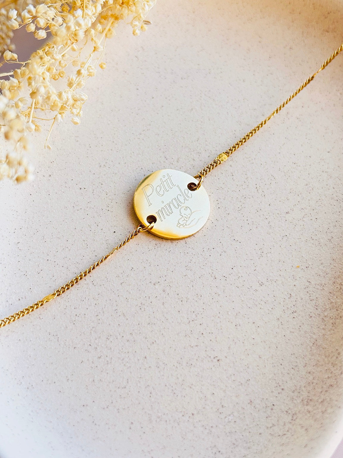 Bracelet femme en acier inoxydable avec chaîne pampille.