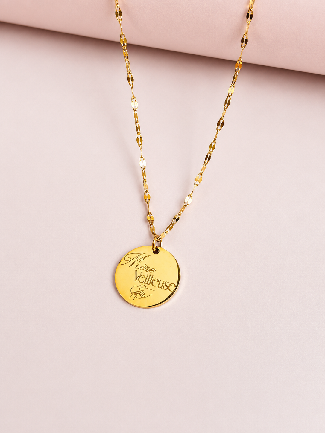 Collier femme en acier inoxydable or poli miroir.