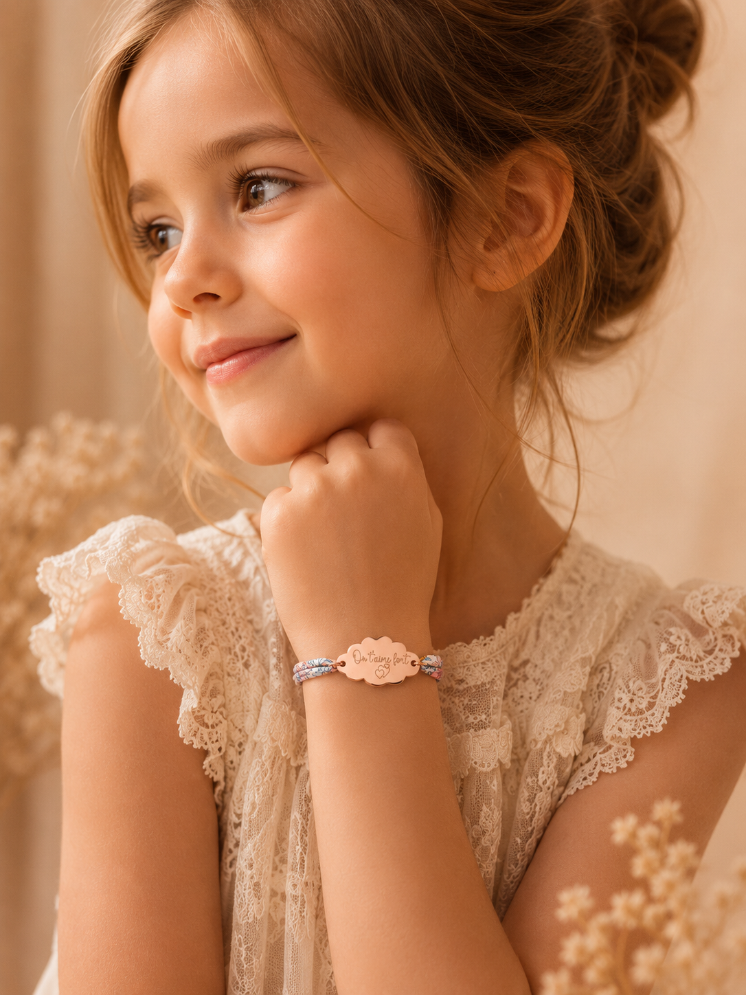 Bracelet personnalisé Gravéa Paris pour enfant en acier inoxydable or rose.