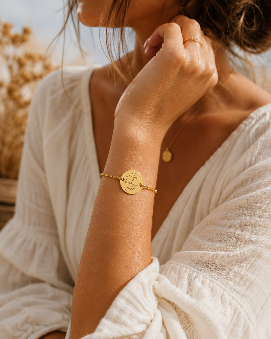 Bracelet femme avec médaille ronde personnalisable de 15 mm.
