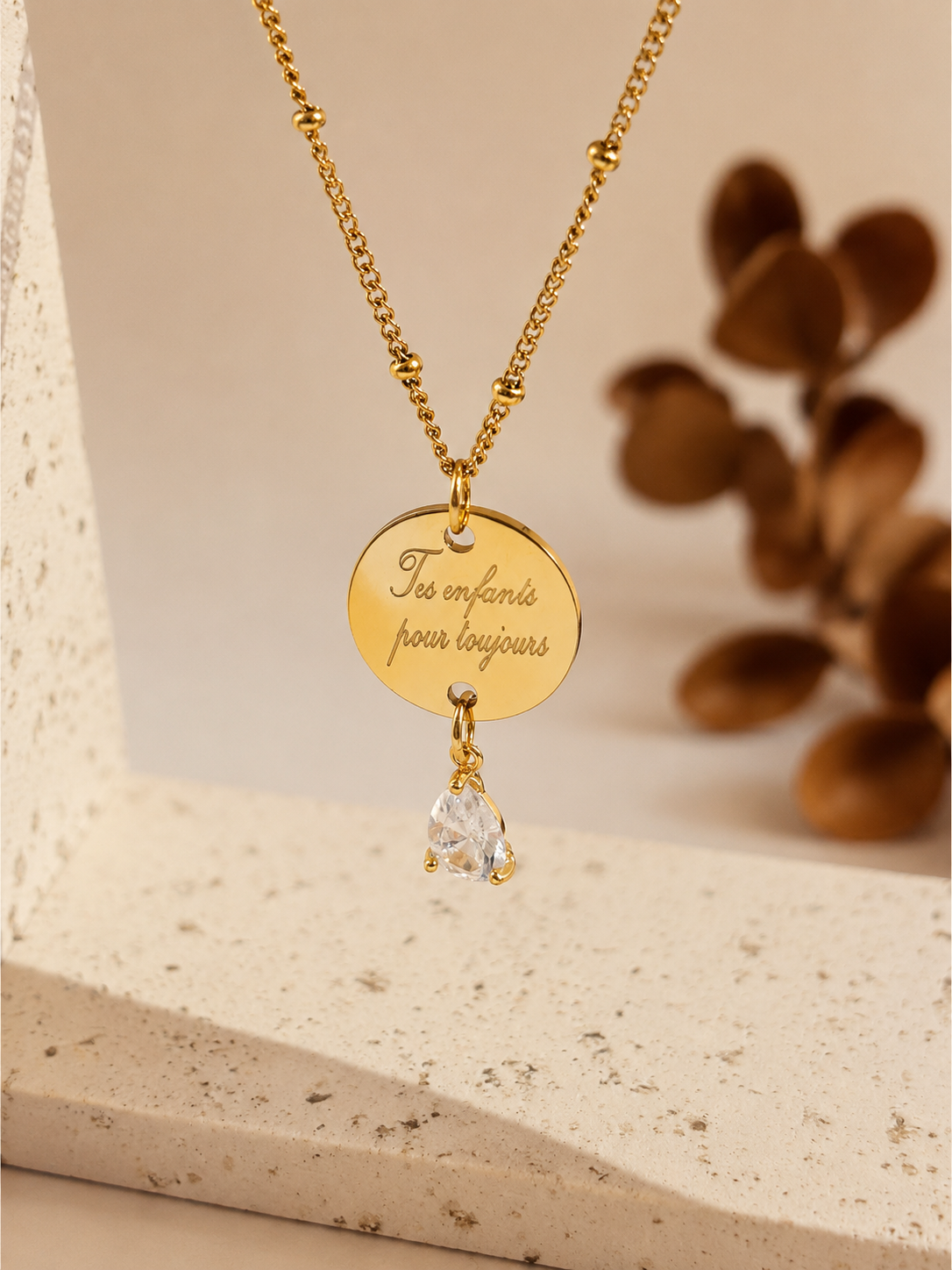     Collier or avec médaille ronde de 15 mm à graver.